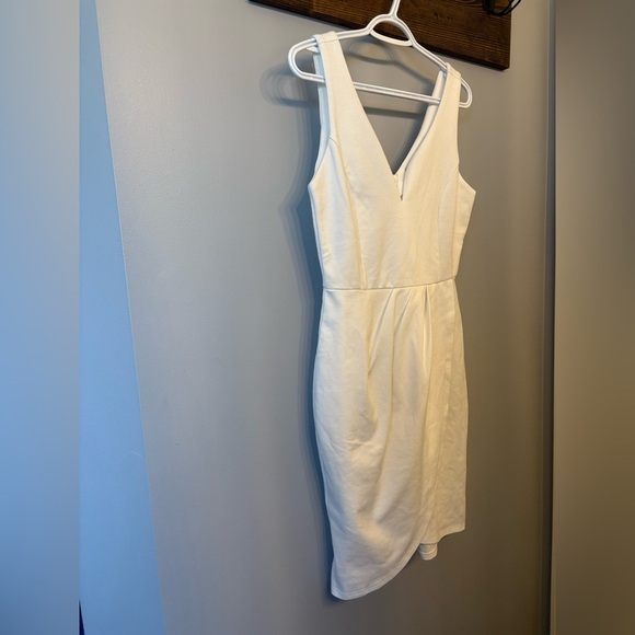 White Asymmetrical Mini Dress with a deep v neckline in size Medium - Picture 2 of 8